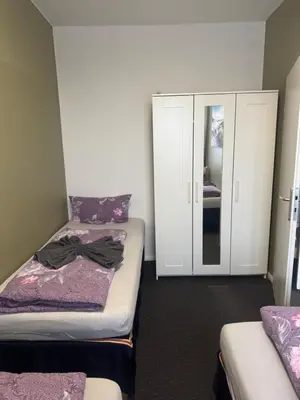 Ein Bett oder Betten in einem Zimmer der Unterkunft Rising Berlin