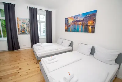 Ein Bett oder Betten in einem Zimmer der Unterkunft Wunderschön, hell und groß