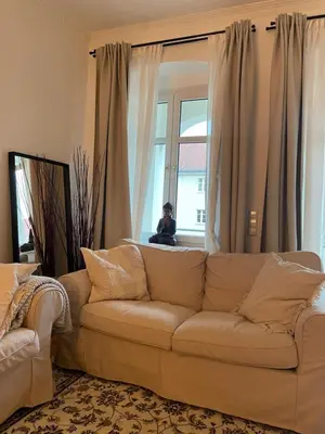 Ein Sitzbereich in der Unterkunft AnnApartment