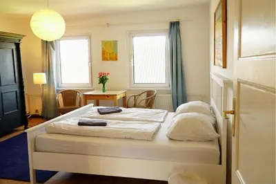 Ein Bett oder Betten in einem Zimmer der Unterkunft Villa Sophienschlösschen nahe Berlin - Exklusive Zeit zwischen 5 Seen mit großer Küche, gratis Sauna & 3500qm Garten