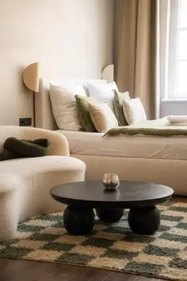 Ein Sitzbereich in der Unterkunft The Charming by Curt Suites