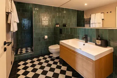 Ein Badezimmer in der Unterkunft The Charming by Curt Suites