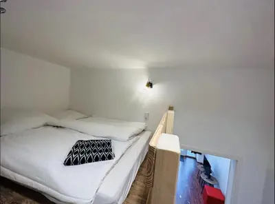 Ein Bett oder Betten in einem Zimmer der Unterkunft Cityflair Apartments Rummelsburg