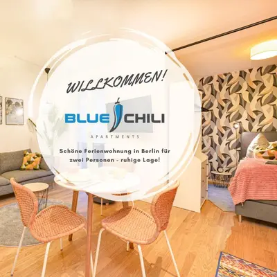 Ein Bett oder Betten in einem Zimmer der Unterkunft Blue Chili 33 - Modernes & gemütliches Business Apartment am Airport BER