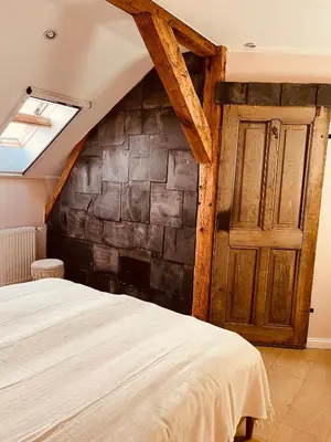 Ein Bett oder Betten in einem Zimmer der Unterkunft Ferienwohnung Auszeit für die ganze Familie