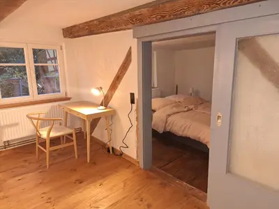 Ein Bett oder Betten in einem Zimmer der Unterkunft Alte Schmiede Buckow