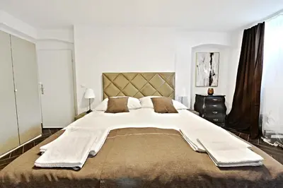 Ein Bett oder Betten in einem Zimmer der Unterkunft Lux Central Apartment