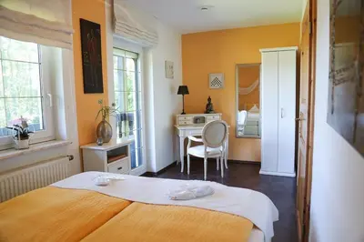 Ein Bett oder Betten in einem Zimmer der Unterkunft Chalet am See