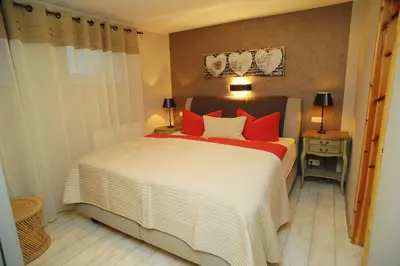 Ein Bett oder Betten in einem Zimmer der Unterkunft Chalet am See