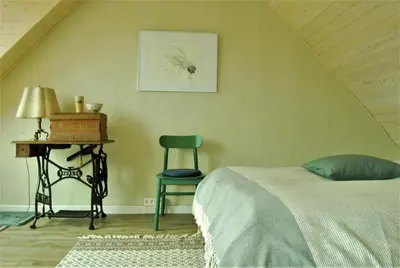 Ein Bett oder Betten in einem Zimmer der Unterkunft Ferien am Roten Haus