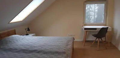 Ein Bett oder Betten in einem Zimmer der Unterkunft Ferienwohnung Bergschäferei