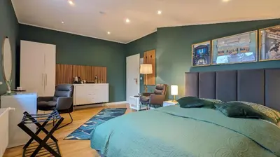 Ein Bett oder Betten in einem Zimmer der Unterkunft 3 ROOMS - Zimmervermietung nähe Flughafen BER - gratis WLAN, Parken & Netflix