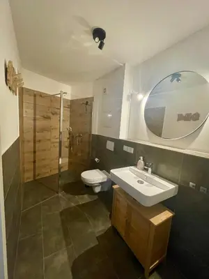 Ein Badezimmer in der Unterkunft DeNe Living Apartments
