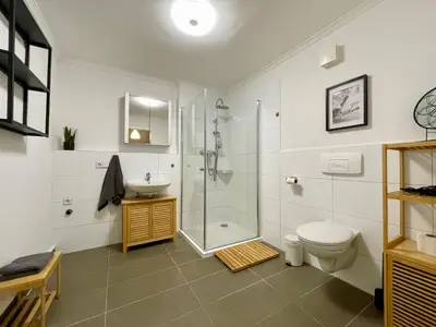 Ein Badezimmer in der Unterkunft DeNe Living Apartments