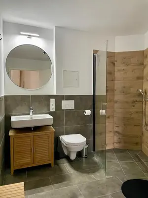 Ein Badezimmer in der Unterkunft DeNe Living Apartments