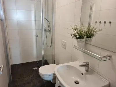 Ein Badezimmer in der Unterkunft Park-Apartment Scharmützelsee Wohnung 1