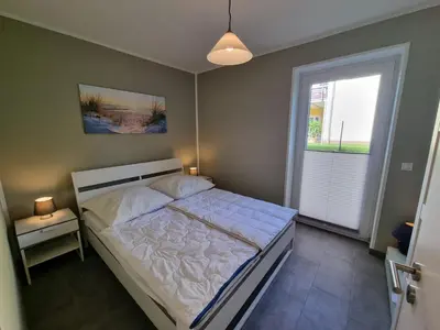Ein Bett oder Betten in einem Zimmer der Unterkunft Park-Apartment Scharmützelsee Wohnung 1