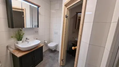 Ein Badezimmer in der Unterkunft Park-Apartment Scharmützelsee Wohnung 7