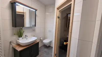 Ein Badezimmer in der Unterkunft Park-Apartment Scharmützelsee Wohnung 7