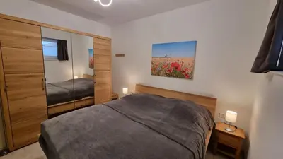 Ein Bett oder Betten in einem Zimmer der Unterkunft Park-Apartment Scharmützelsee Wohnung 9