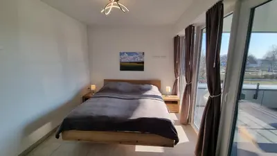 Ein Bett oder Betten in einem Zimmer der Unterkunft Park-Apartment Scharmützelsee Wohnung 9