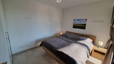Ein Bett oder Betten in einem Zimmer der Unterkunft Park-Apartment Scharmützelsee Wohnung 9