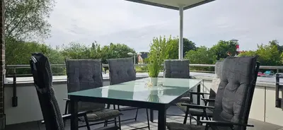 Ein Balkon oder eine Terrasse in der Unterkunft Park-Apartment Scharmützelsee Wohnung 10