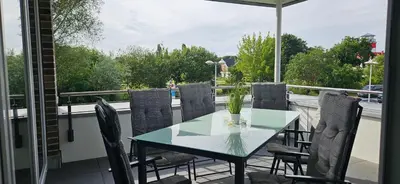 Ein Balkon oder eine Terrasse in der Unterkunft Park-Apartment Scharmützelsee Wohnung 10