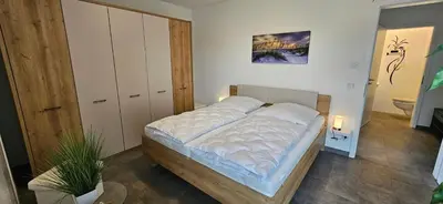 Ein Bett oder Betten in einem Zimmer der Unterkunft Park-Apartment Scharmützelsee Wohnung 10