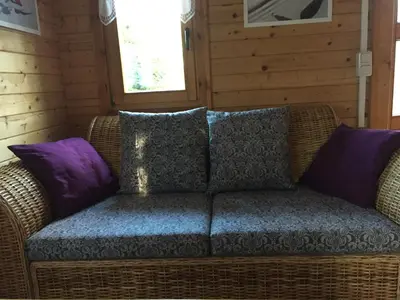 Ein Sitzbereich in der Unterkunft Ferienhaus Natura