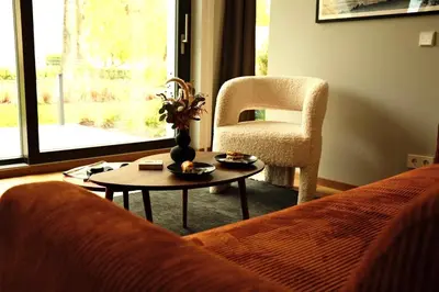 Ein Sitzbereich in der Unterkunft bluestar apartments am Storkower See inkl Badesteg und Gartensauna