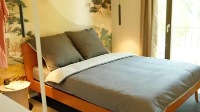 Ein Bett oder Betten in einem Zimmer der Unterkunft bluestar apartments am Storkower See inkl Badesteg und Gartensauna