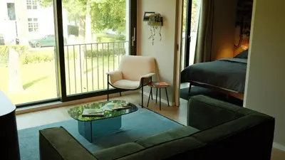 Ein Sitzbereich in der Unterkunft bluestar apartments am Storkower See inkl Badesteg und Gartensauna
