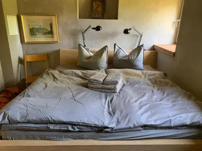 Ein Bett oder Betten in einem Zimmer der Unterkunft Im Naturschutzgebiet gelegene Ferienwohnung