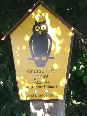 Ein Zertifikat, Auszeichnung, Logo oder anderes Dokument, das in der Unterkunft Im Naturschutzgebiet gelegene Ferienwohnung ausgestellt ist