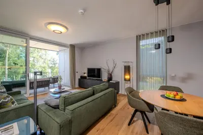 Ein Sitzbereich in der Unterkunft Marina Apartment Seeblick mit Pool und Sauna