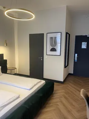 Ein Bett oder Betten in einem Zimmer der Unterkunft Motel Blue Messe