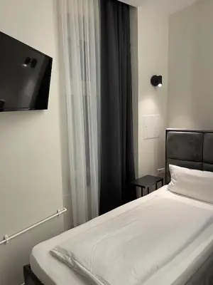 Ein Bett oder Betten in einem Zimmer der Unterkunft Motel Blue Messe