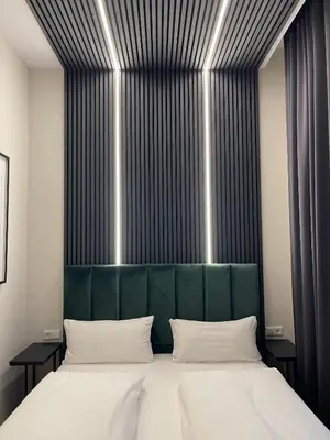 Ein Bett oder Betten in einem Zimmer der Unterkunft Motel Blue Messe