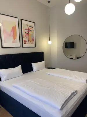 Ein Bett oder Betten in einem Zimmer der Unterkunft Motel Blue Messe
