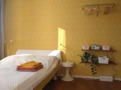 Ein Bett oder Betten in einem Zimmer der Unterkunft Mitte von Mitte - Blick auf den Turm