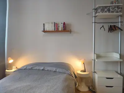 Ein Bett oder Betten in einem Zimmer der Unterkunft Mitte von Mitte - Blick auf den Turm