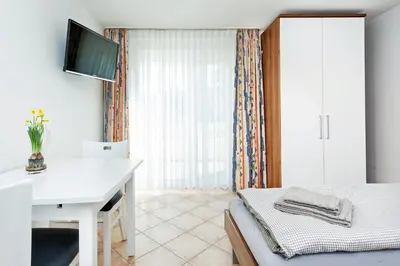 Ein Bett oder Betten in einem Zimmer der Unterkunft Ferienwohnung Berlin