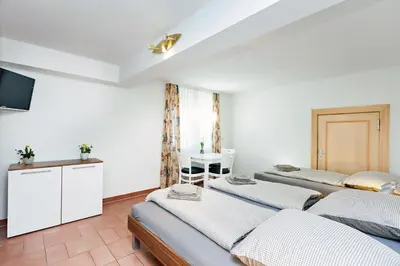 Ein Bett oder Betten in einem Zimmer der Unterkunft Ferienwohnung Berlin