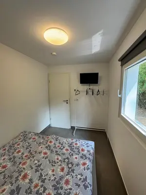 Ein Bett oder Betten in einem Zimmer der Unterkunft Ferienbungalow Am Meisengang