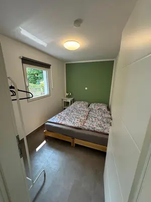 Ein Bett oder Betten in einem Zimmer der Unterkunft Ferienbungalow Am Meisengang