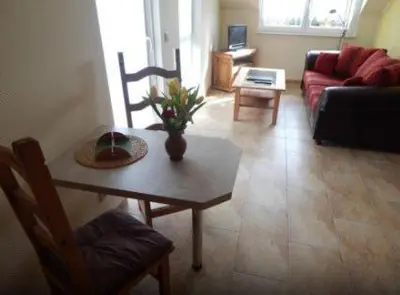 Ein Sitzbereich in der Unterkunft Pension + Apartments Tor zum Spreewald