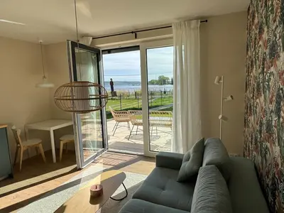Ein Sitzbereich in der Unterkunft Auszeit am Schwielowsee - Moderne Ferienwohnung direkt am Schwielowsee