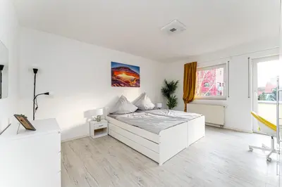 Ein Bett oder Betten in einem Zimmer der Unterkunft 5-Zimmer-Apartment nahe Müggelsee