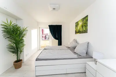 Ein Bett oder Betten in einem Zimmer der Unterkunft 5-Zimmer-Apartment nahe Müggelsee